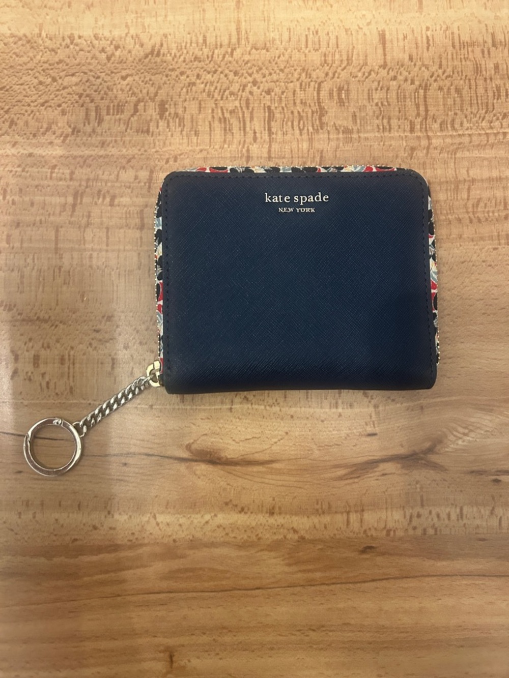 Kate Spade navy blue saffiano leather bifold zip around wallet with keychain